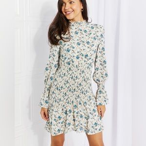 Floral smocked mini dress.